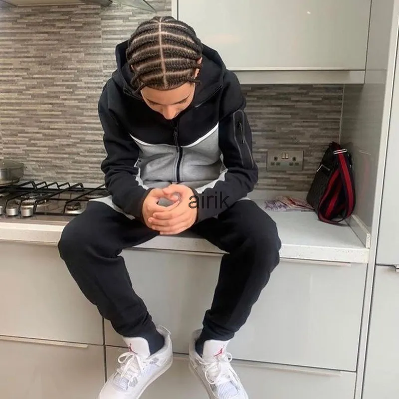 Tech fleece sales tracksuit womens