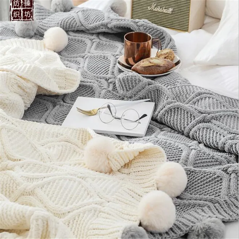 Knitted throws with pom poms cheap