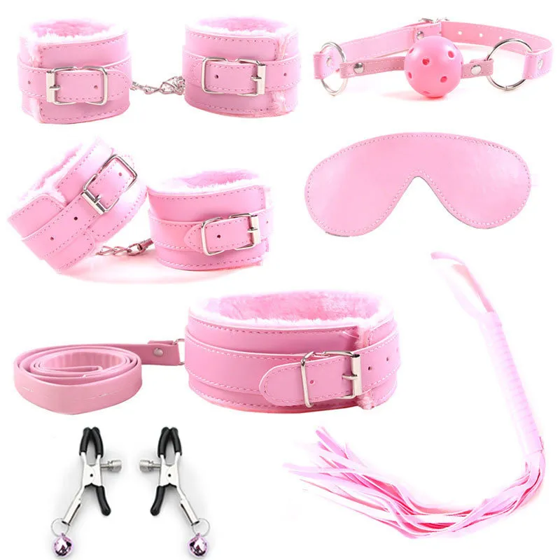 taking clothes off sexy BDSM. Sexy girl posing in handcuffs and on leash - Stock Photo [16076976] main image 1