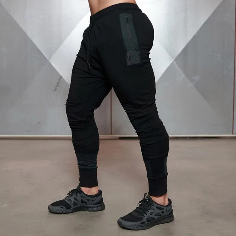 Pantaloni da jogger ricamati da uomo Pantaloni sportivi muscolari Pantaloni casual da uomo in tinta unita Pantaloni sportivi da palestra