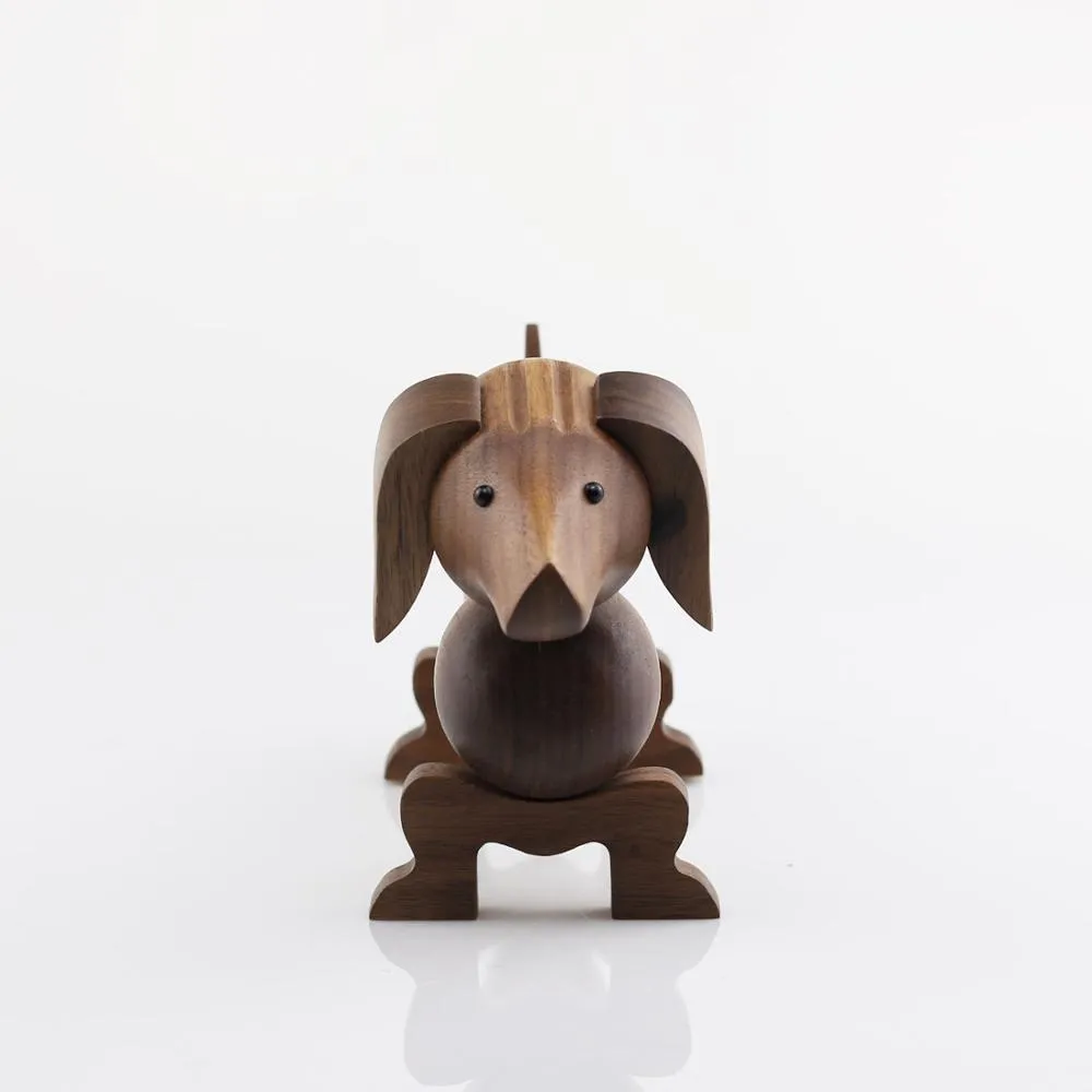 手彫りの黒いクルミダックスフンドミニチュアの置物 犬愛好家のための