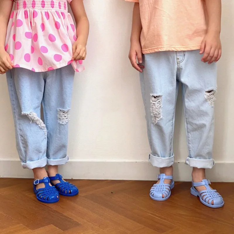 JK coreano qualità bambini ragazzi ragazze moda jeans pantaloni pantaloni pantaloni buco design unisex abbigliamento per bambini