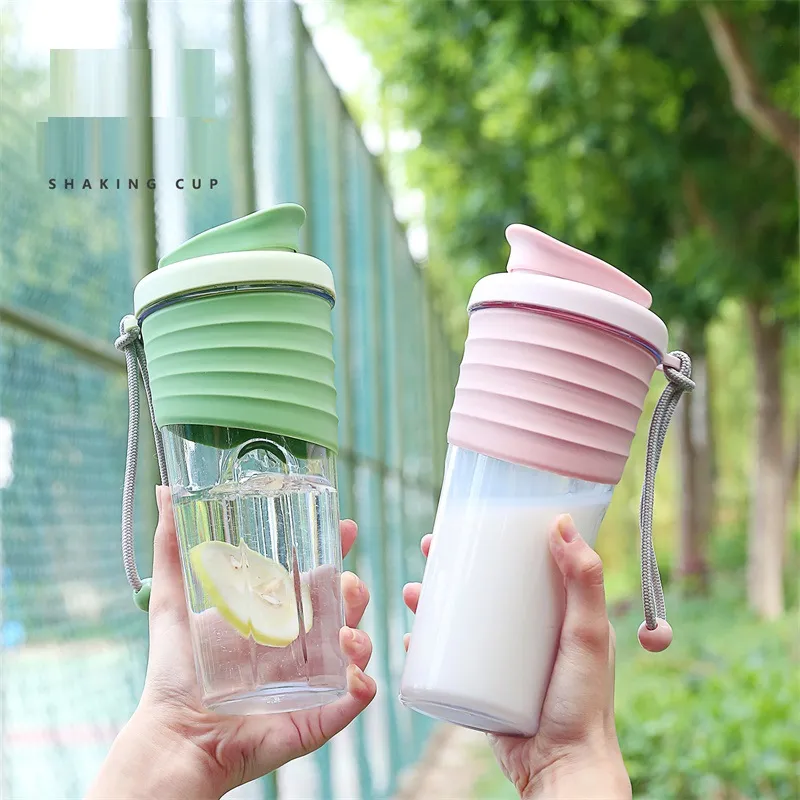 700ML Plastic Milkshake Protein Powder Shaking Bottles Outdoor Sports Fitness Water Cup with Stirrer Ball and Rope