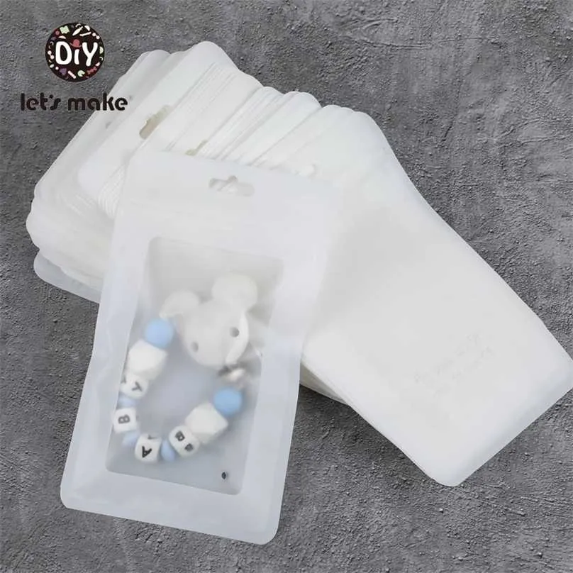 Faisons des sacs en plastique blanc 100pcs (19.5x11.5cm) affichage sans BPA bébé jouets paquet spectacle poinçon pendentif accessoires 211106
