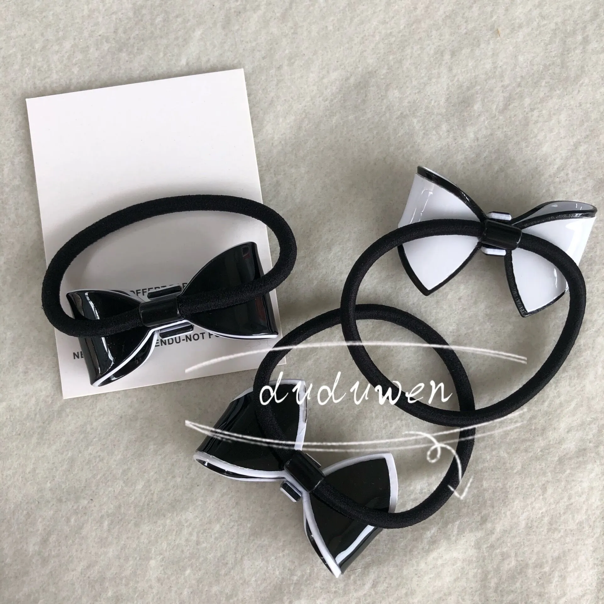 mode 2C boutique Bowknot akryl hårslips fashion elastisk handfest presentsamlingsobjekt med kort