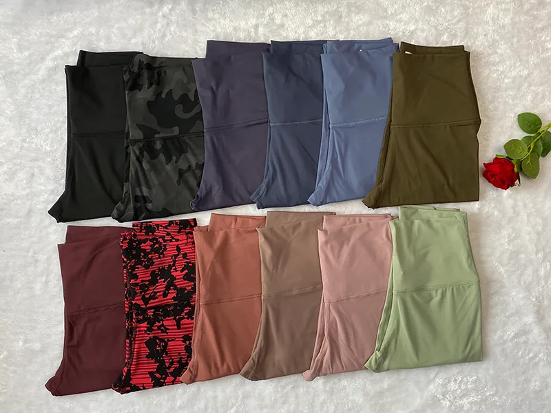 Pantaloni da yoga da donna in tinta unita Pantaloni sportivi da palestra a vita alta Leggings Elastic Fitness Lady Tuta intera da allenamento