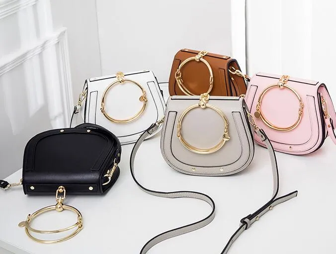 Saddle shaped handbag hotsell
