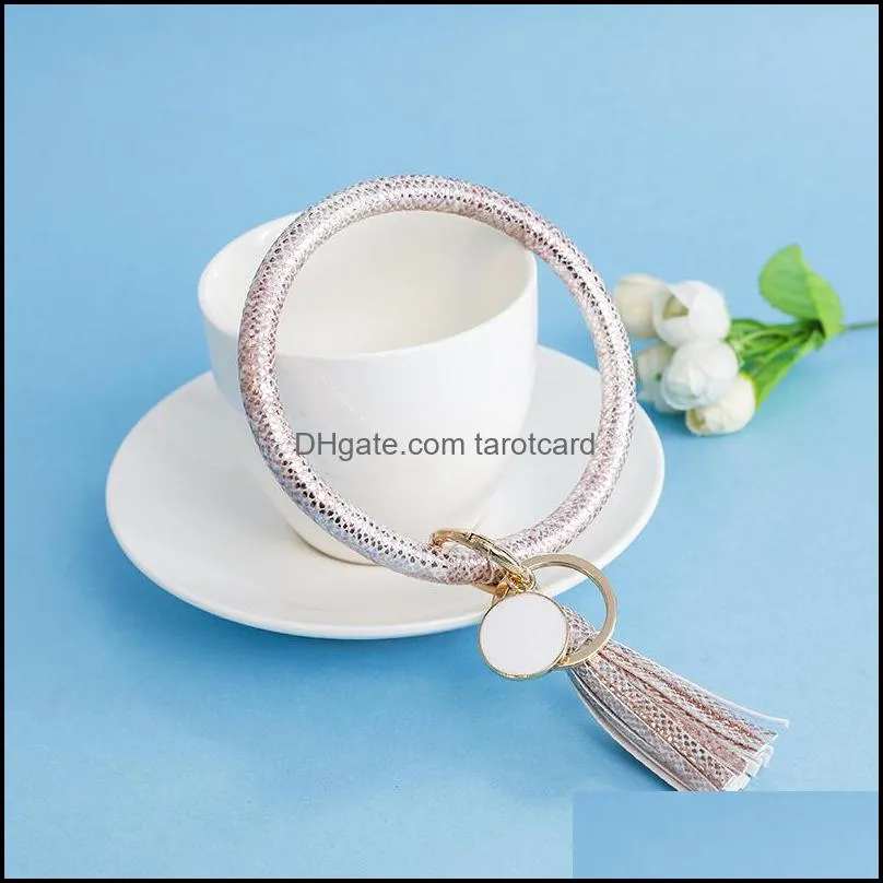 Wholesale Multi-colors PU Leather O Bracelet KeyChains Circle Cute Same Color Tassel Wristlet Keychain For Women Girls