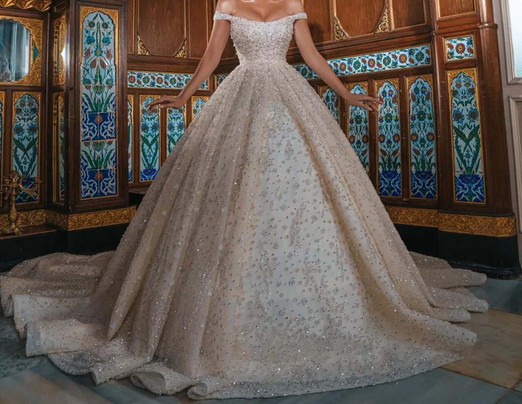 Glitter Off Shoulder Ball Gown Wedding Dresses 2021 Luxury Sparkly Beading Bridal Gowns med Long Train Vestidos de Novia Robe Marie