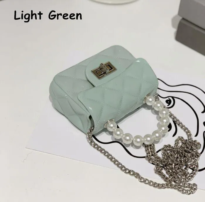 2021 Mini baby bags hot New Jelly Bag Candy Color Pearl Wrist Change Bag PVC Mini Tote handbag