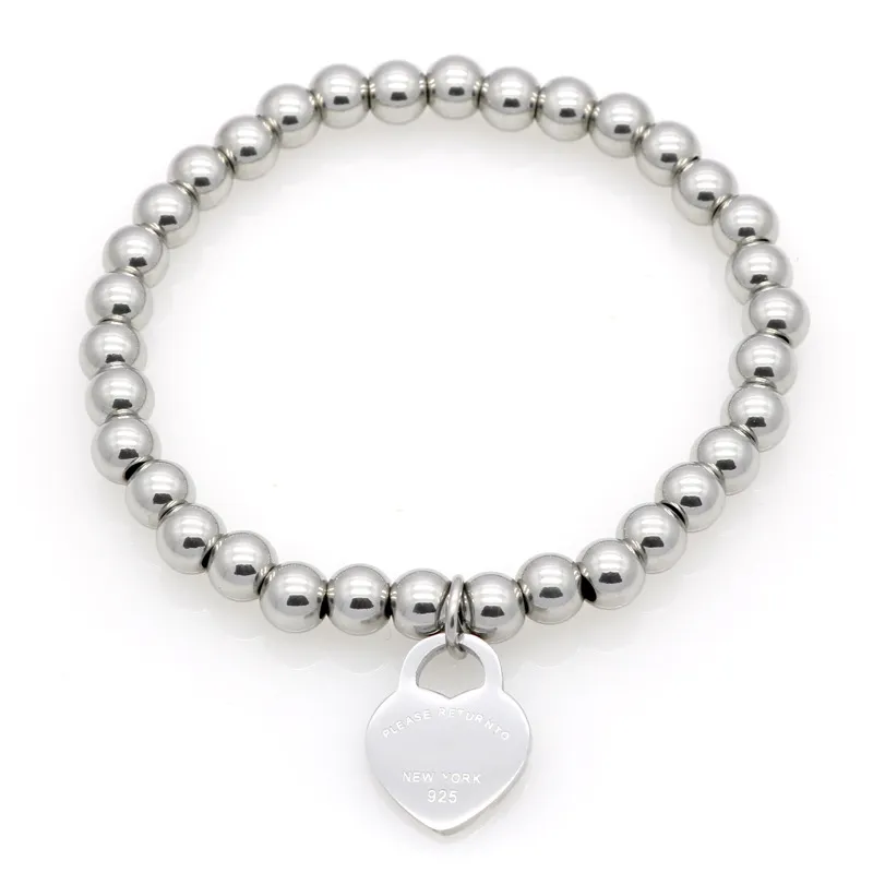 Nowe Kobiety Miedź Zroszony Bransoletka Ze Stali Nierdzewna Powrót do Heart Charms T List Pulsera Bransoletka 1 sztuk Drop Shipping