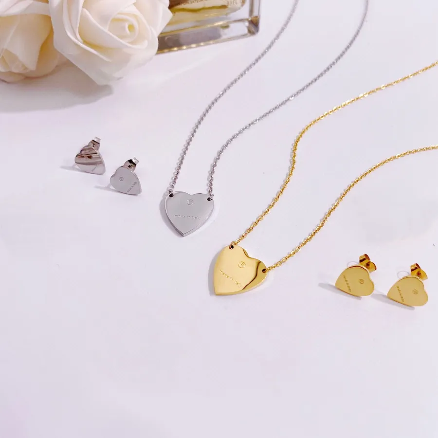 Stylish Ladys 316L Titanium Steel Gold Heart Necklace With Engraved Letter  And 18K Gold Plating From Discountstore2015, $8.24