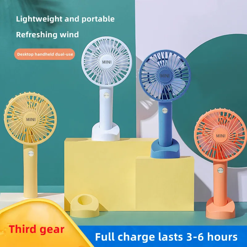 2022 Sommar Ny Handheld Electric Fan Portable Desktop With Mobile Phone Bracket Hand Holding USB Uppladdningsbar Tre-Speed ​​Wind Speed ​​Mini Fan