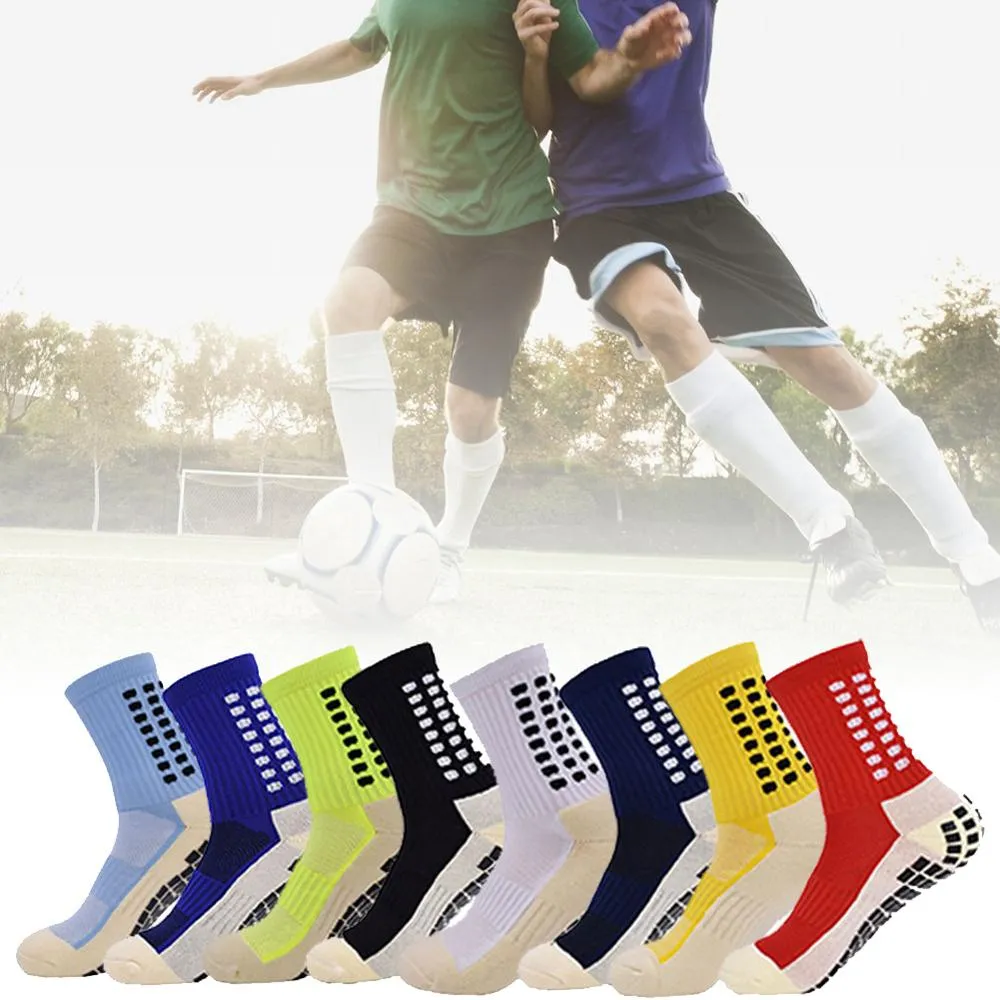 1 par de calcetines atléticos de fútbol antideslizantes