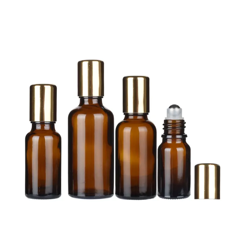 Vuoto Rotolo di crema per gli occhi in vetro marrone trasparente su bottiglia ricaricabile Rullo in acciaio Tappi in oro con perline di vetro 5ml 10ml 15ml 20ml 30ml 50ml 100ml Fiale di olio essenziale per massaggio portatile