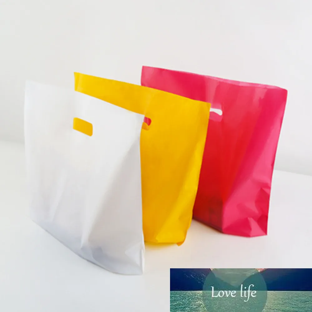 50pcs /ロットカラフルなプラスチック買い物袋の再利用可能なリサイクル可能な防塵服