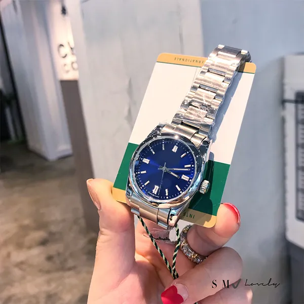 Luxury Stainless Steel Smooth Sweep Quartz Watch For Men And Women