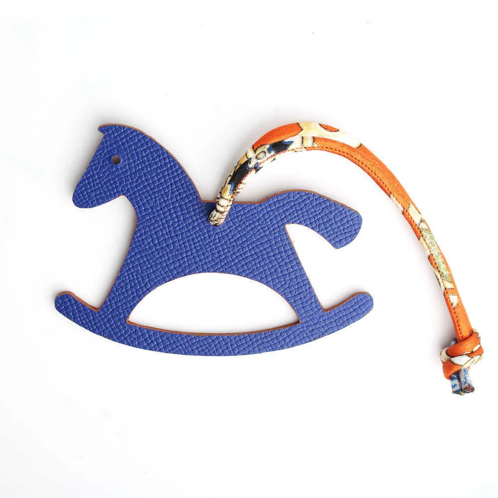 Berömd designer lyxig äkta siden äkta läder Seahorse Deer Keychain ryggsäck Pendant Animal Key Chain Women Bag Charm H0915256I