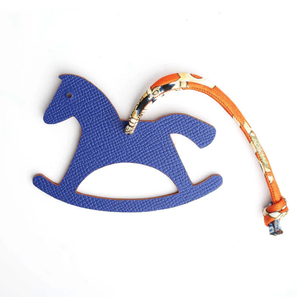 Berömd designer lyxig äkta siden äkta läder Seahorse Deer Keychain ryggsäck Pendant Animal Key Chain Women Bag Charm H0915307O