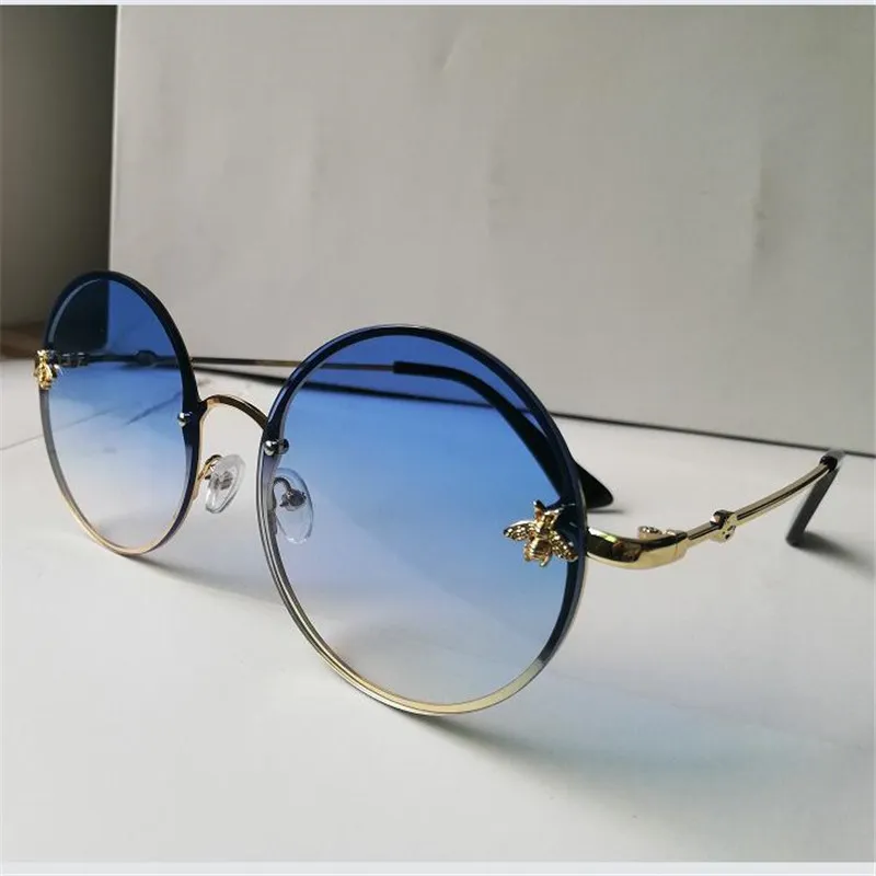 solglasögon metallram solglasögon solglasögon marina film kvinna metall solglasögon som kör UV400 mode eyewear