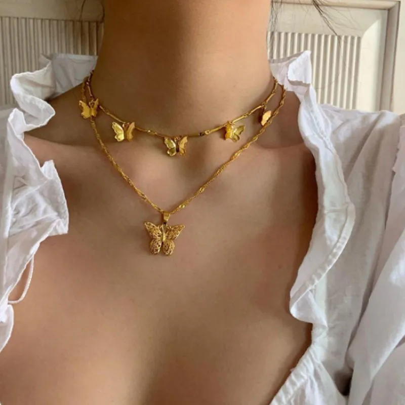 Collana elegante con ciondolo a forma di farfalla per donna, affascinante regalo di gioielli per matrimoni con catena in oro multistrato