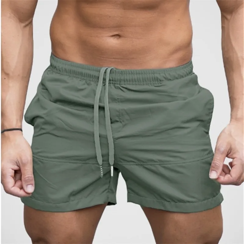 The summer men's beach pants pure color fashion casual tether shorts 210716