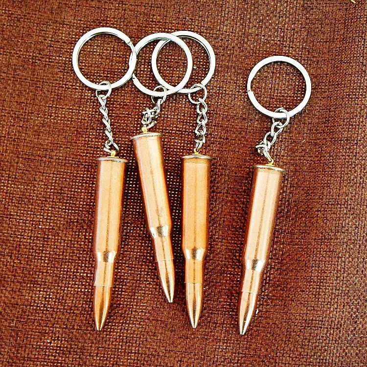 Bullet Key Chain Party Favor Mężczyźni Chłopcy Projektant Moda Metal Symulacja Shell Pistolet Zbiornik Samolot Hammer Bell Ear Pick Brelovenir