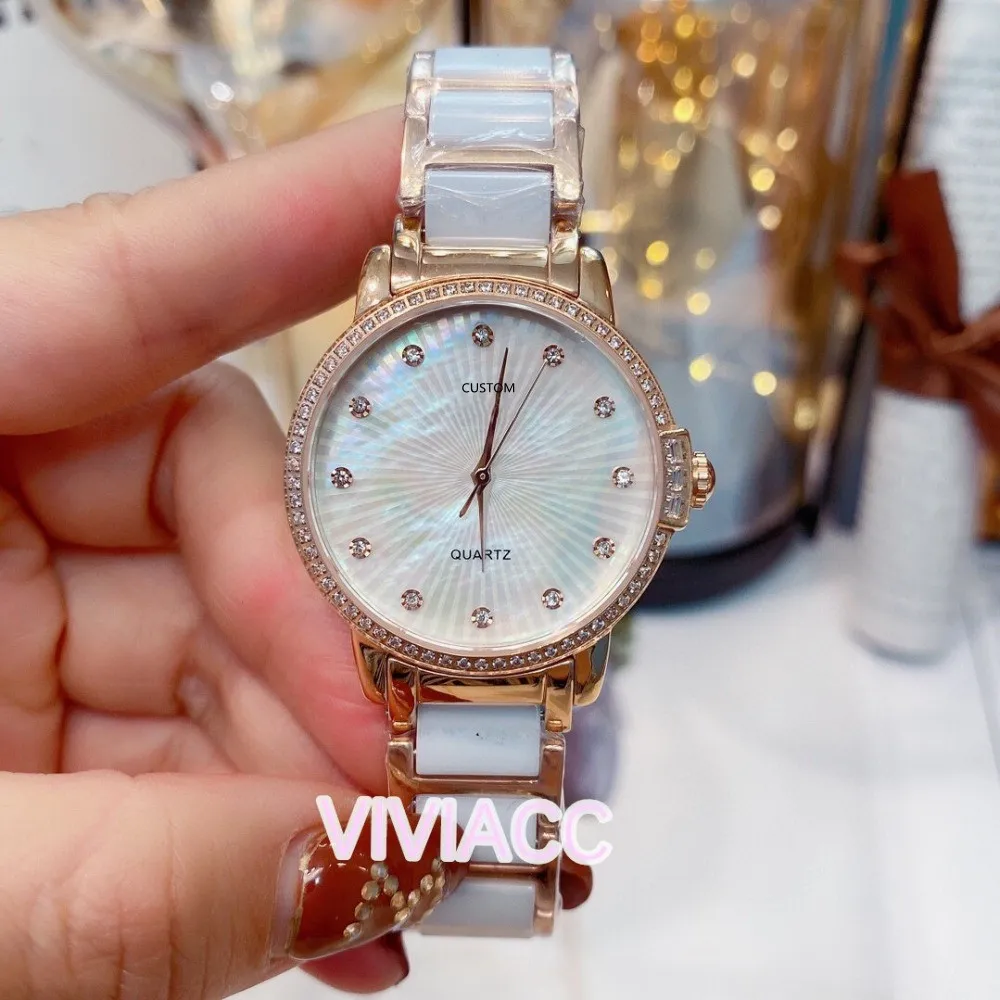 Yeni Moda Kadınlar Geometrik Hat Saatler Doğal Anne Inci Dial Kuvars Saat Kadın Beyaz Siyah Seramik Bilek İzle 33mm