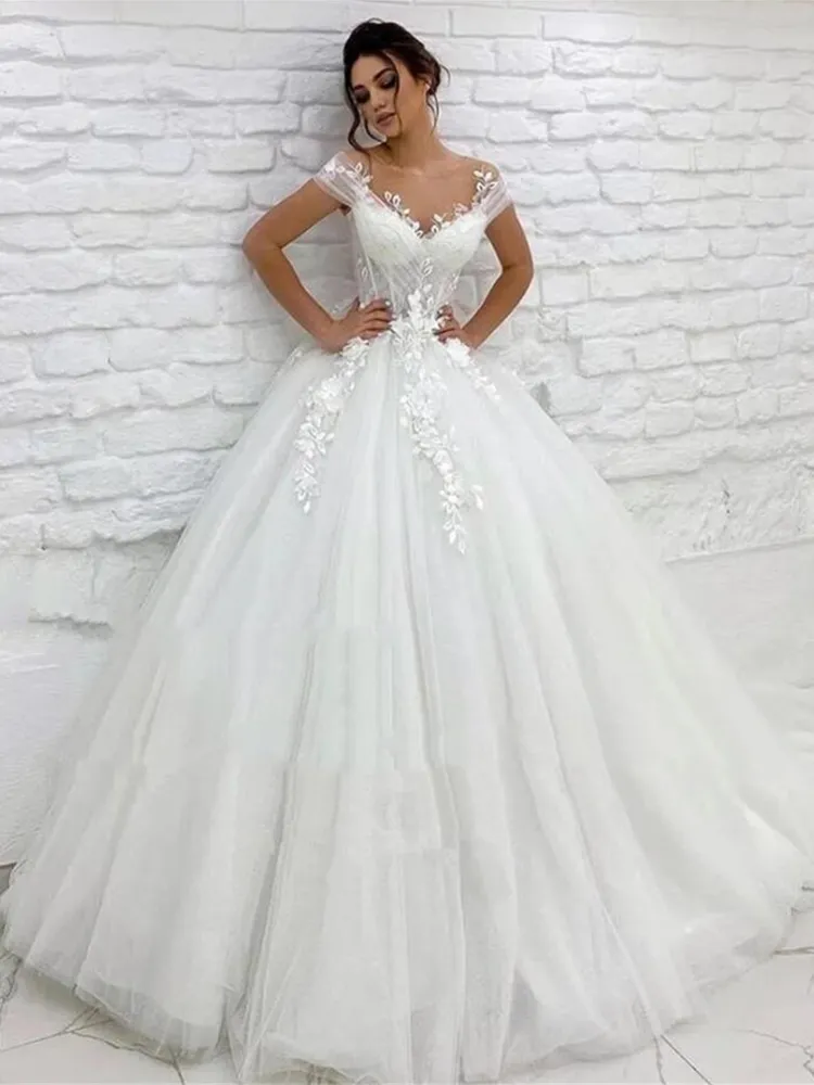 2022 Spring Elegant Tulle Princess Wedding Dresses Bridal Gowns Sheer Neck Cap Sleeves Lace Applique Garden Long Train Bride Dress With Back Buttons Robe De Mariage