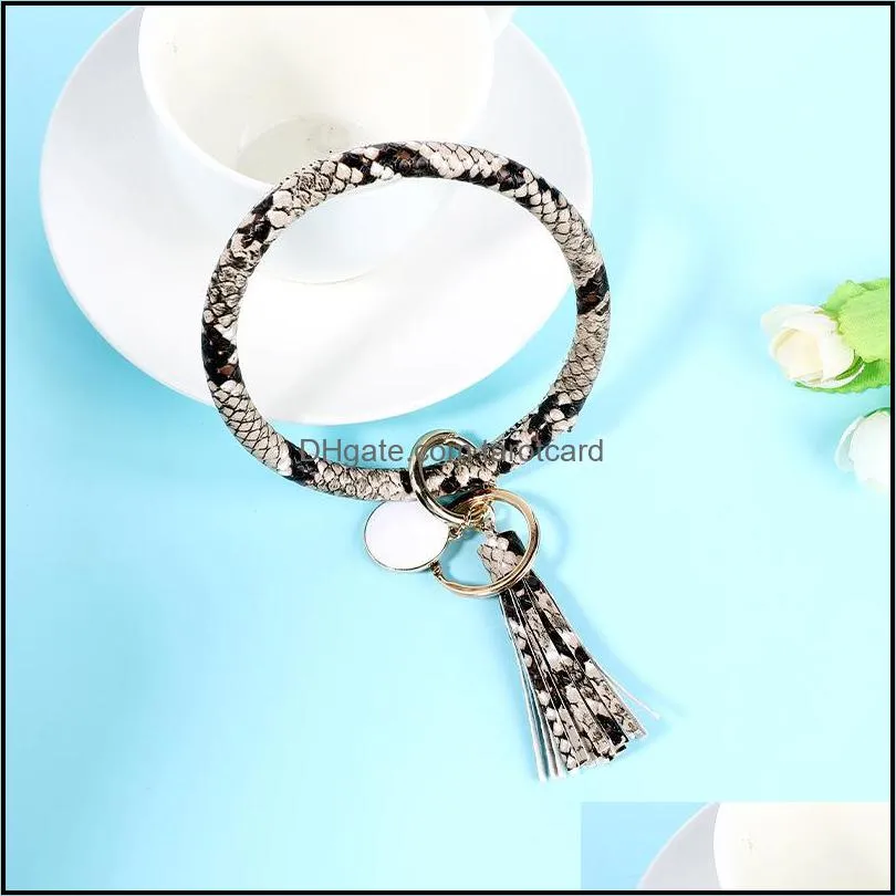 Wholesale Multi-colors PU Leather O Bracelet KeyChains Circle Cute Same Color Tassel Wristlet Keychain For Women Girls