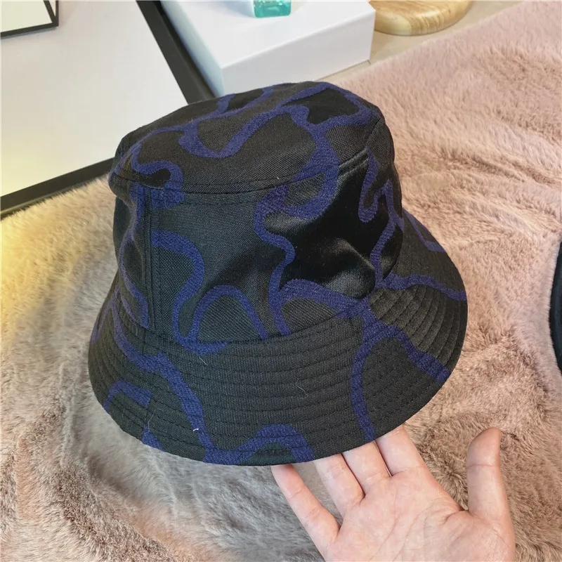 2021ファッション帽子女性ヨーロッパとアメリカのインターネットホットセールカウンター新しい迷彩バケツ帽子レトロなパターン日焼け止め盆地帽子
