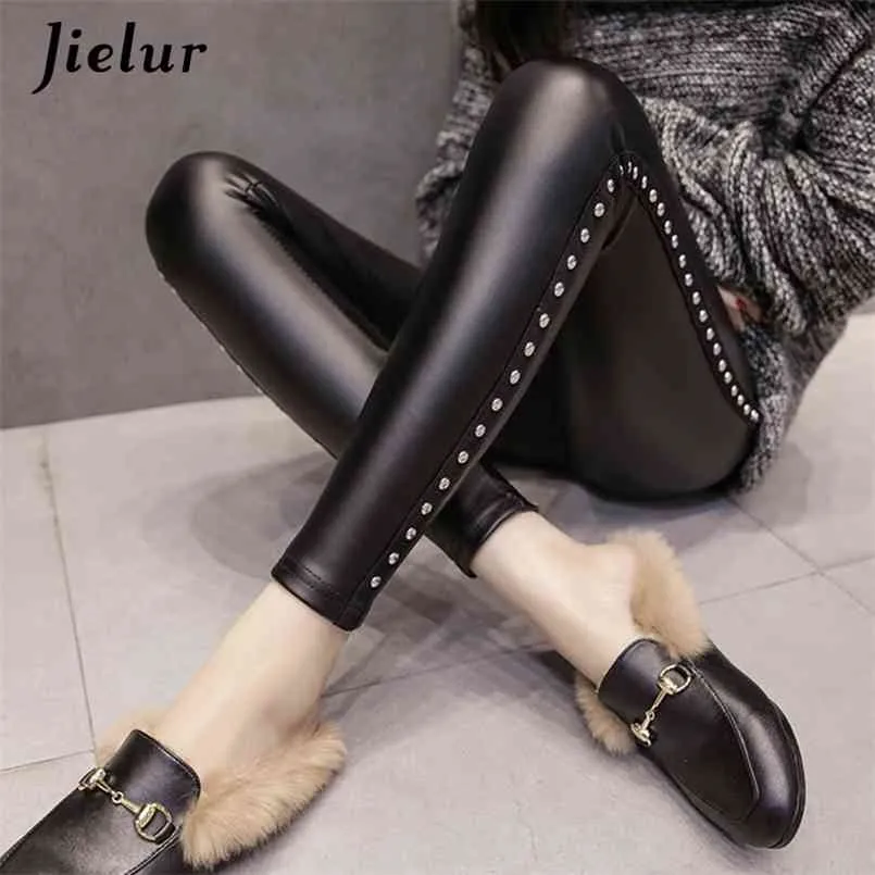 Jielur vinter fleece matte pu läder leggings kvinnor mode nitar push up penna byxor 4 färger s-xxxl lady hög midja legging 210925