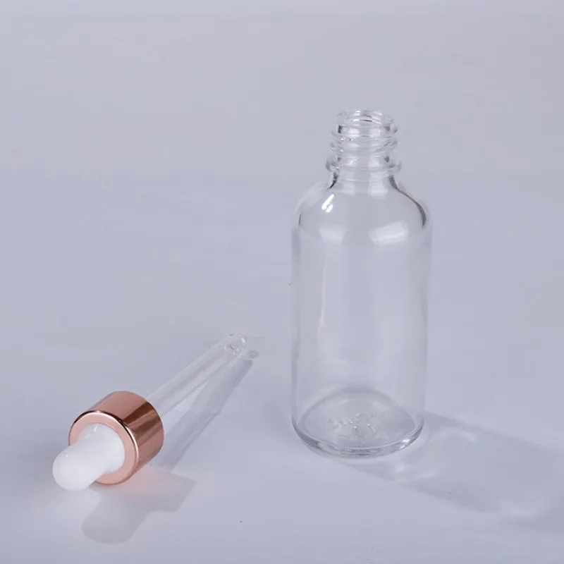 5ml 10ml 15ml 20ml 30ml 50ml 100ml Bottiglie contagocce in vetro trasparente Pipetta per olio essenziale Conservazione degli imballaggi
