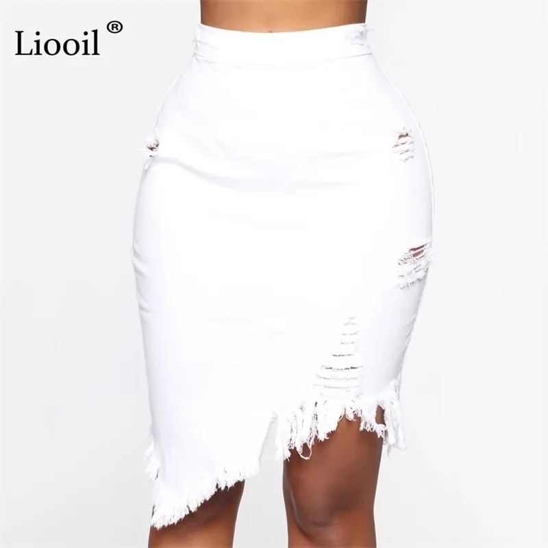 Liooil asymétrique coton noir blanc trou Denim jupe mi-longue avec gland Streetwear taille haute lavage en détresse femmes jupe moulante 210303