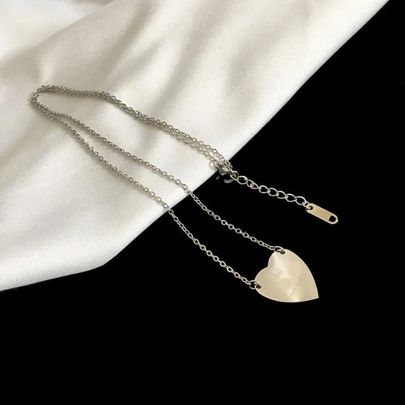 Classique luxueux coeur collier femme en acier inoxydable couple chaîne en or pendentif bijoux sur le cou cadeau pour petite amie accessoires en gros