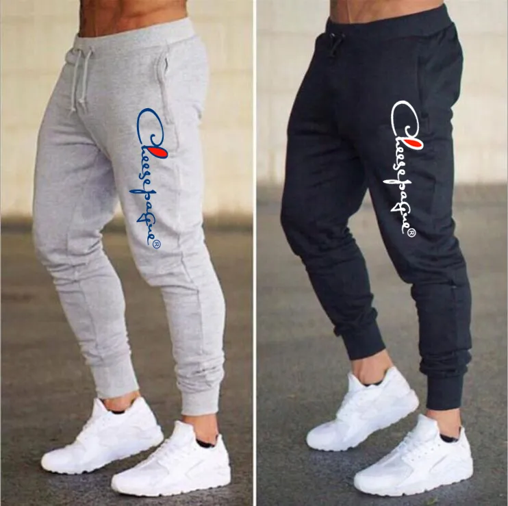 Merkbrief afdrukken Spier Fitness Hardloopbroek Training Sport Katoenen broek Heren Ademende Slim Beam Mouth Casual Gezondheidsbroek