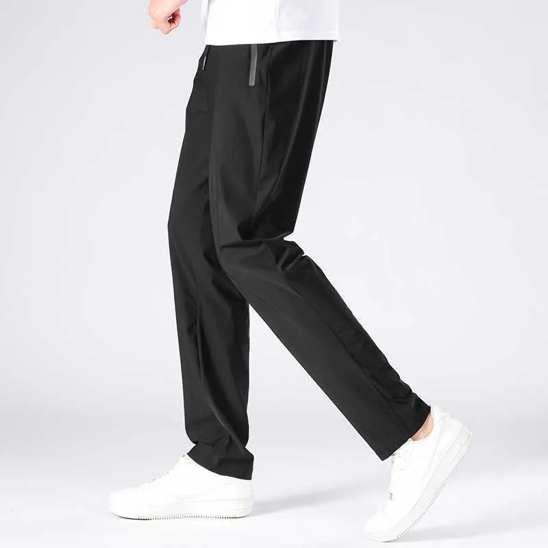 Aziatische maat nieuwe casual grote broek mannen zomer coole sweatpants mannelijke broek ademend elastische zwarte broek heren kleding 8XL 7XL Y0811