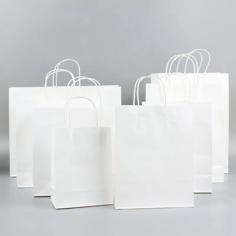 16*8*21 cm 100 pièces papier Kraft blanc vêtements emballage sacs à provisions mode poignée sac d'emballage pour chaussures pantalons vêtements Logo personnalisé dessus disponible