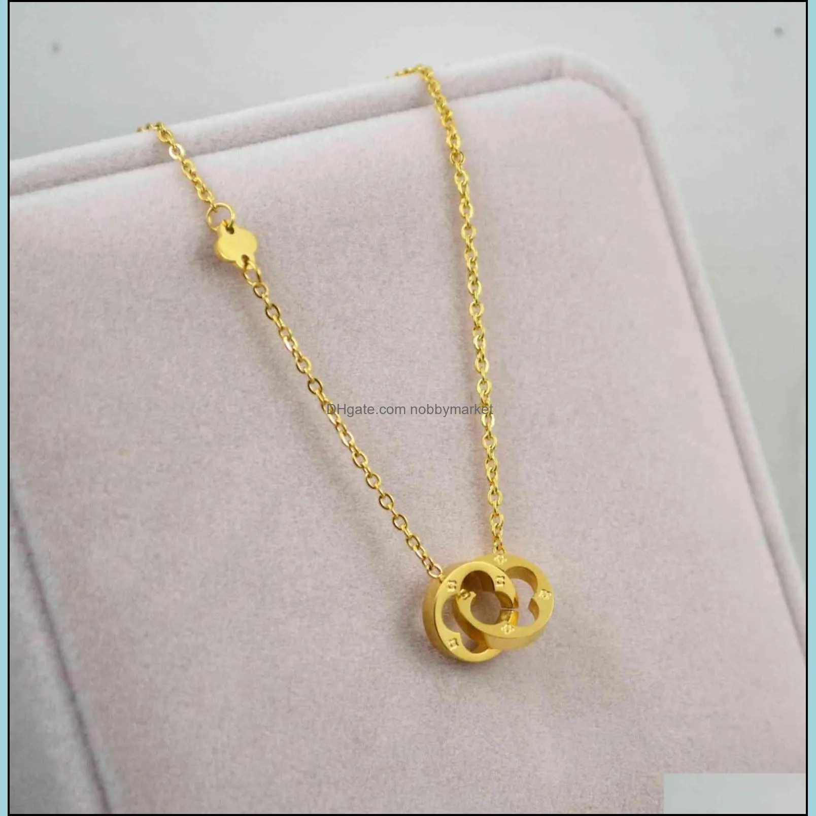 New Korean hollow out double ring clover short necklace fashion hot selling titanium steel button lucky grass clavicle Necklace