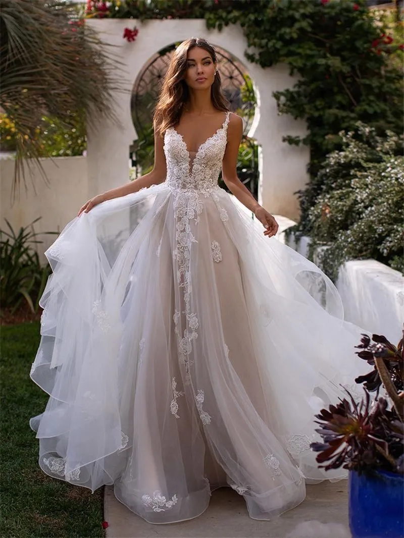 Bohemian Champagne A Line Wedding Dress with Lace Appliques, Spaghetti Straps, and Open Back - Perfect for Country or Beach Weddings