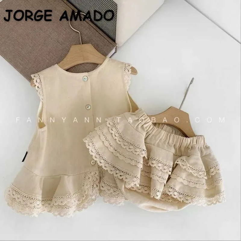 Set da 2 pezzi per ragazza estiva all'ingrosso Top senza maniche in pizzo beige + pantaloncini Vestiti per bambina E2132 210610