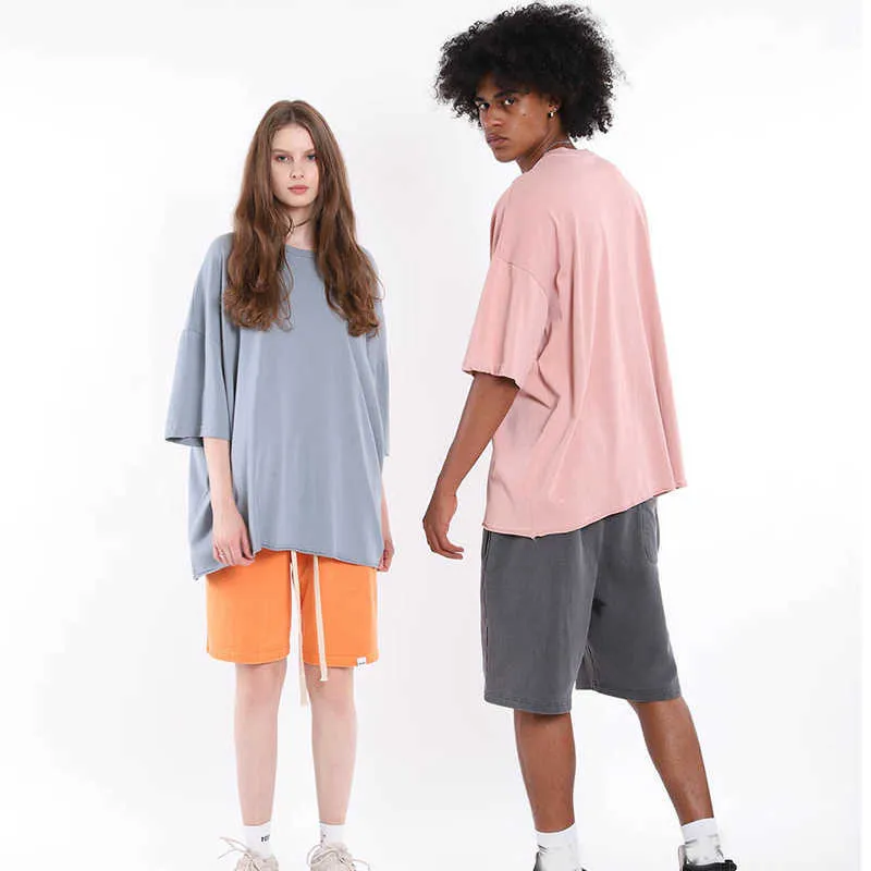 Nyanländer Solid Färg Män Kvinnor Lös Casual Short Sleeve T Shirt Style StreetWear Fashion Solid Color Top Tees Y0809
