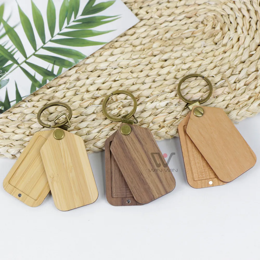 Cinghia del piatto in legno Keychain Key Chain vuoto Custognizzazione personalizzata all'ingrosso Design di portachiavi in ​​legno con magnetica per foto