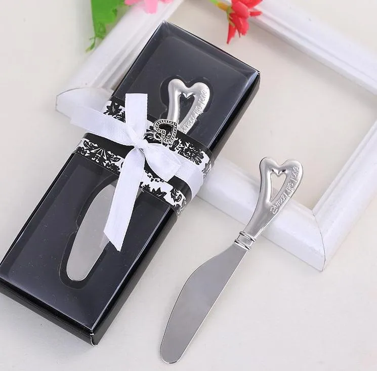 「愛を広げる」ステンレス鋼ハートバターナイフの結婚式の好意と党の贈り物のための贈り物卸売