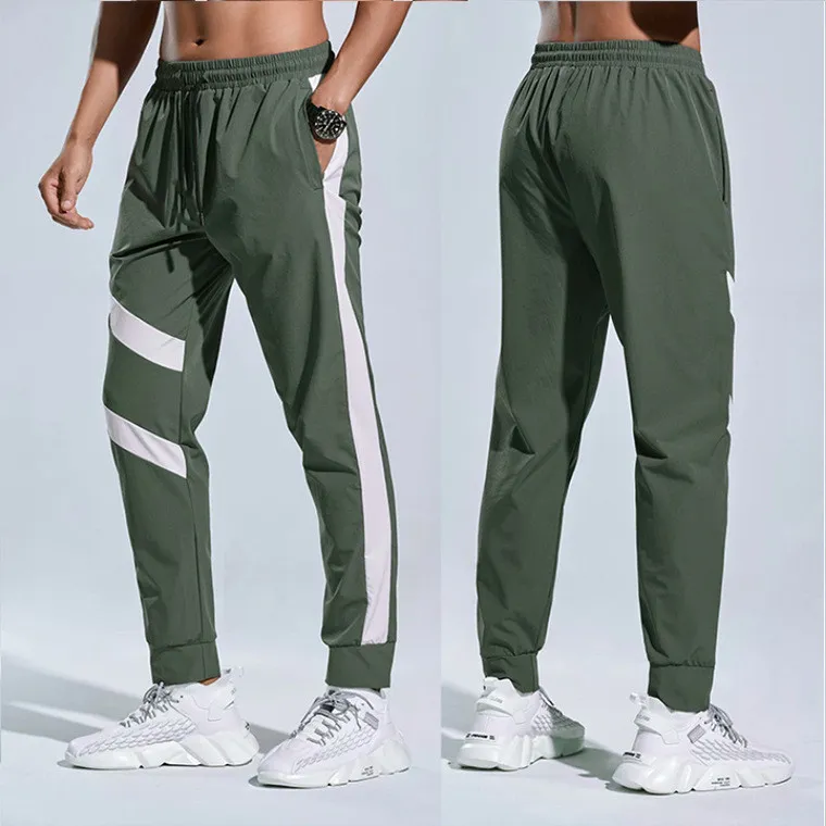 pantaloni da uomo casual allentati quick dry pantaloni lunghi splicing running gym jogger sport yoga pantaloni sportivi sottili da jogging tasche dei pantaloni fondo 260q