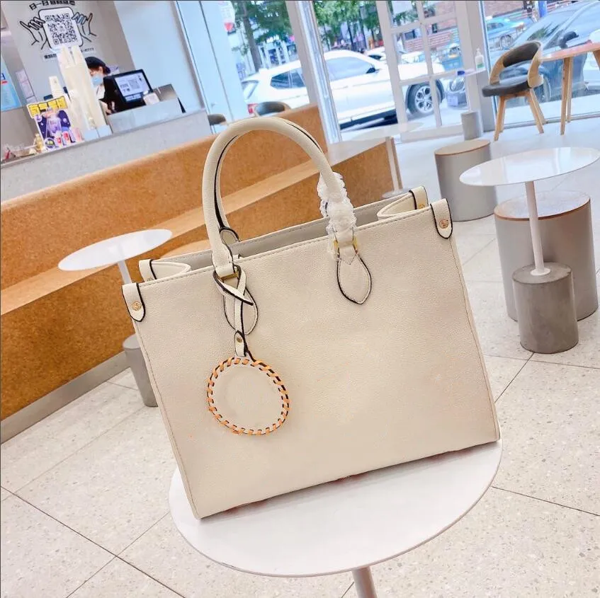 M57639 Designer Top End Women Women Shopping Bag Bag Giant Canvas Flower Flowerized Cowhide Colorful Leather Onthego Purs232O
