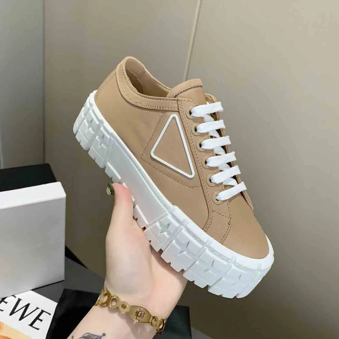 rubber platform women men casual shoes sneaker inspired by motocross tires defines the design of nylon gabardine sneakers this logo triangle decorate50 mm box