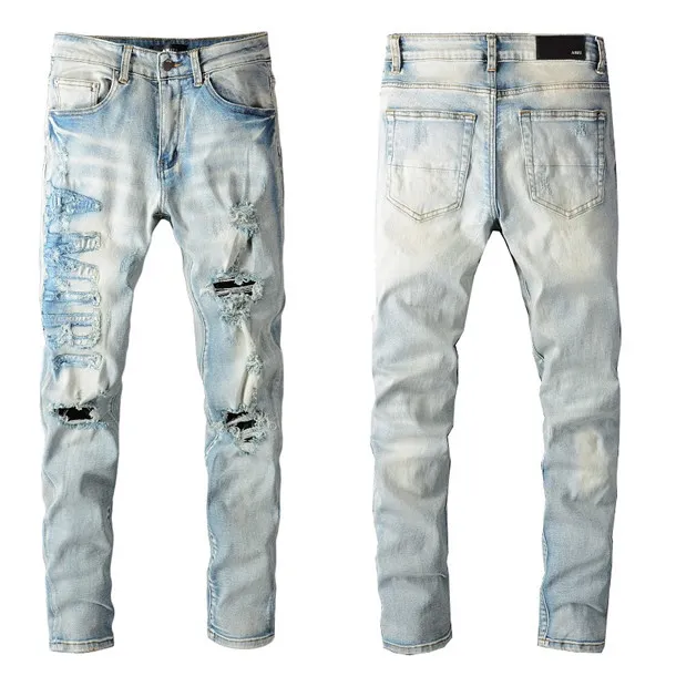 Luxurys Designer Mens Jeans最新のリスティングストリップレターデニムパンツファッションリッピングカジュアルなhomme男性ホールズボンサイズw29-40250v