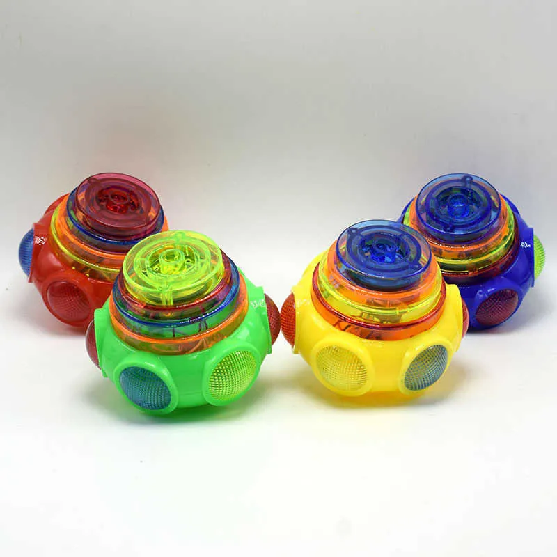 12 pçs/lote UFO Deriva Luz Colorida Música Gyro Peg-Top Spinner Tops Crianças Presentes Mercado Brinquedos Plástico Unissex Dedo Spinner Top