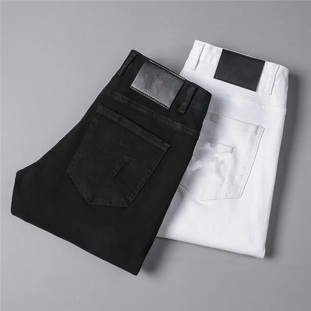 Высококачественные мужские дизайнерские роскоши джинсы черный белый пара продана Продавец проблемных деловых людей повседневная уличная одежда мужчина джинсовая рок тонкий подходит для ноги разорванные отверстия полоса известные брюки W40